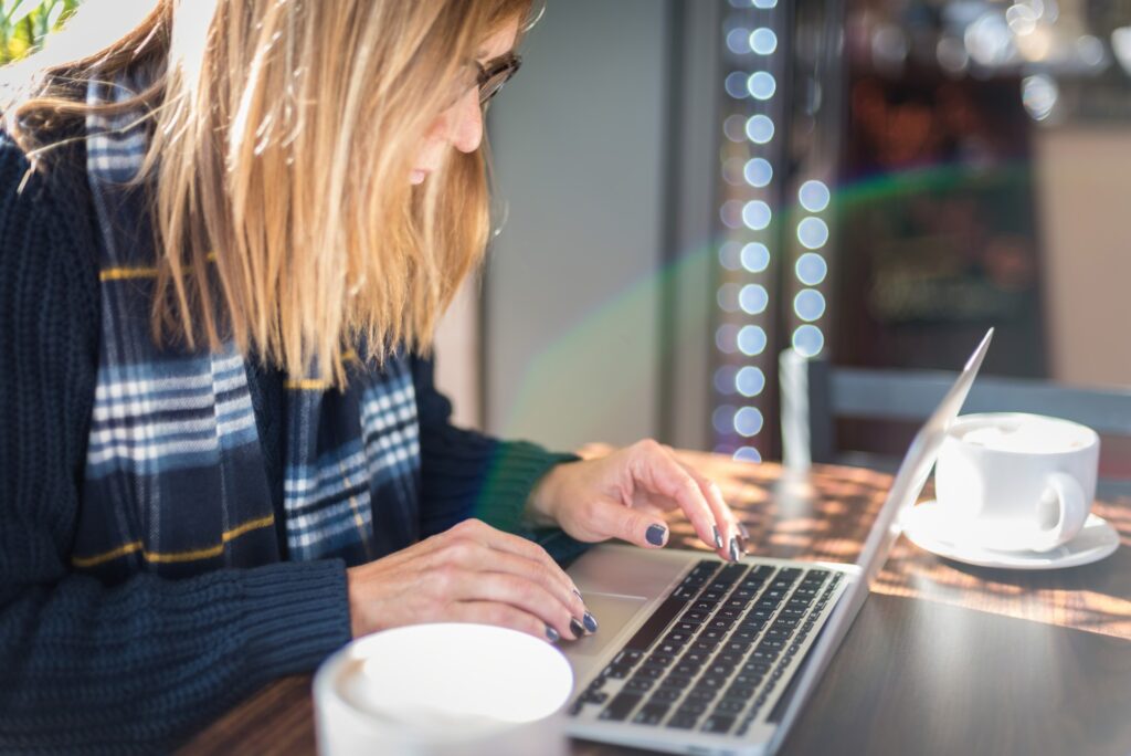 content marketer using her laptop 