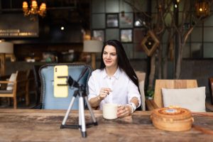 what is a content marketer includes creator recording video using her phone