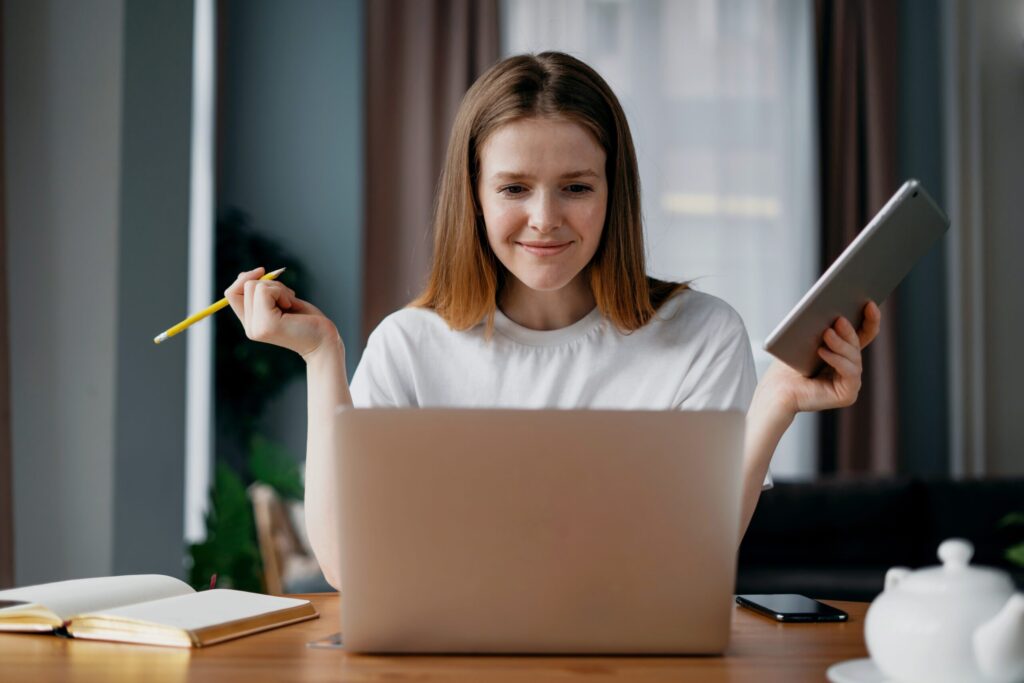 A woman strategizing for b2b email marketing strategy.