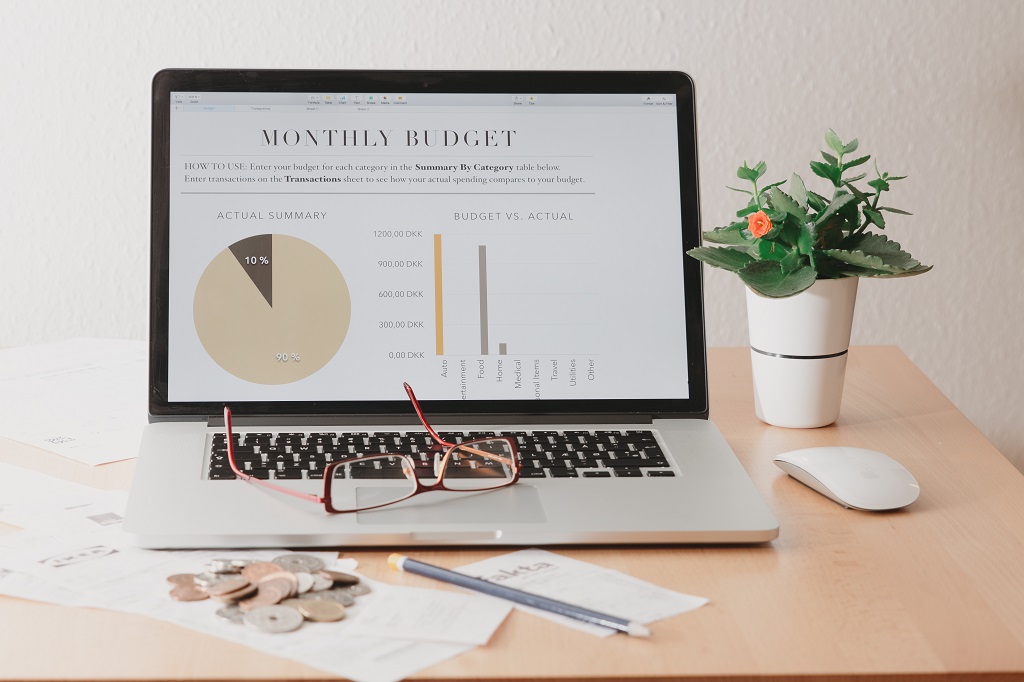 A pie chart on a laptop showing cost effective monthly budget