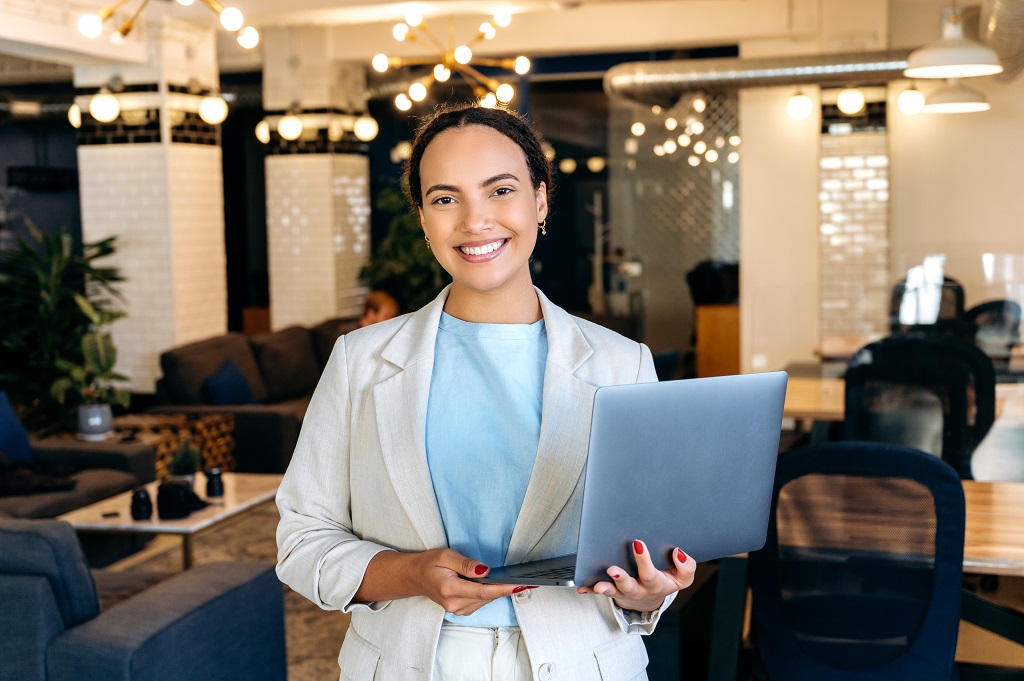 Local SEO specialist holding a laptop