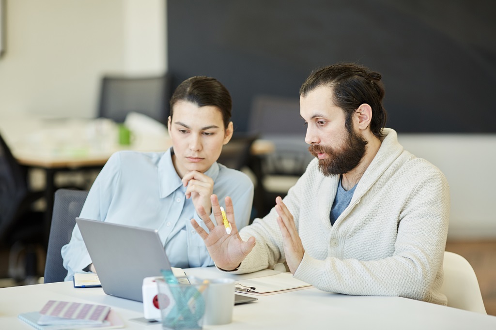 a group of executives collaborating to create an impactful branding strategy for their company